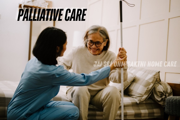 Compassionate nurse from Jai Sri Ohm Sakthi Home Care providing palliative care and support to an elderly woman in Coimbatore, helping her with mobility and ensuring comfort in her home environment